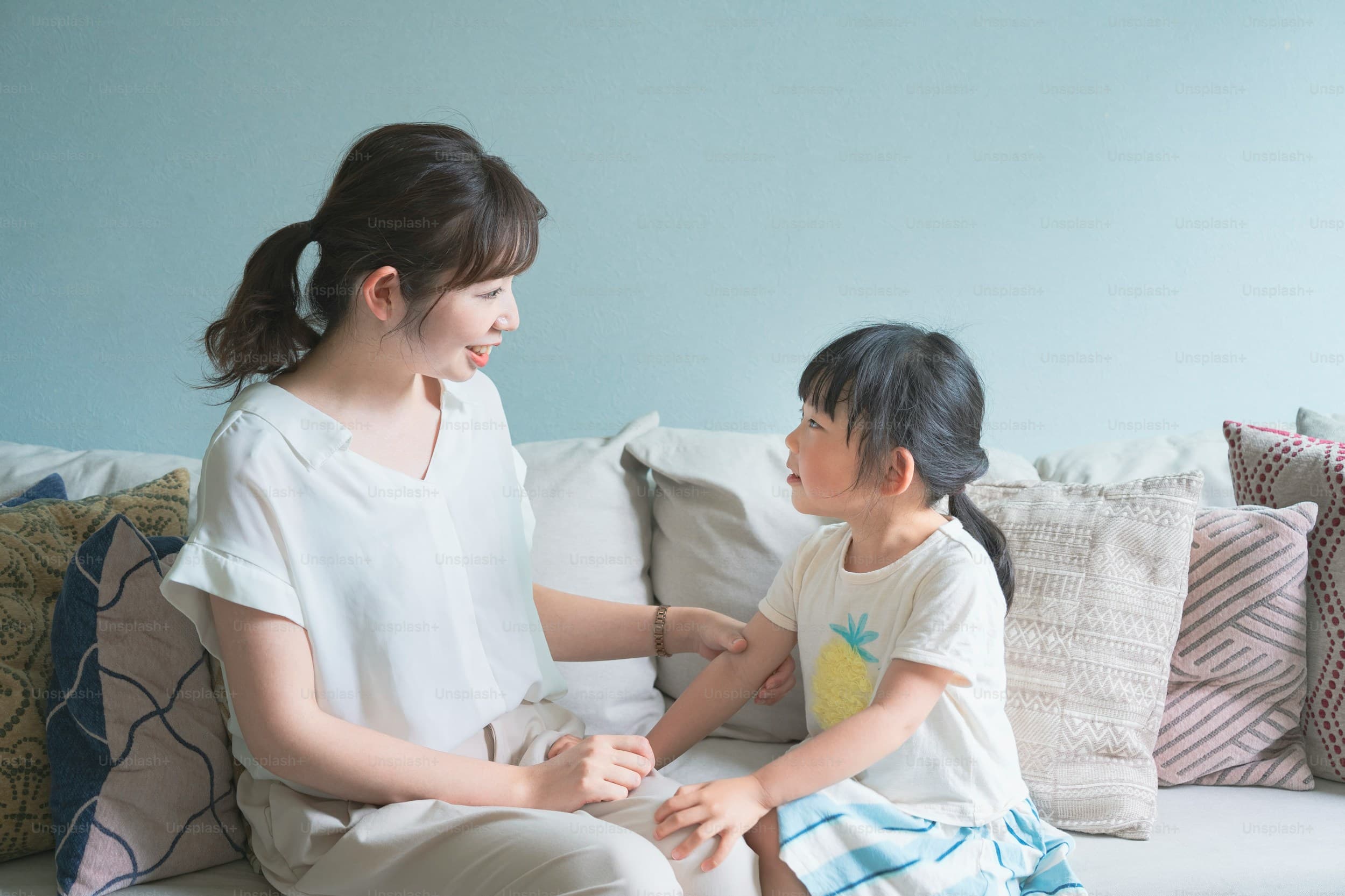 Nanny interacting with child